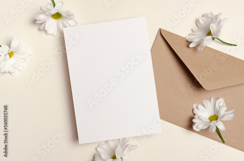 Invntation or greeting card mockup with envelope and flowers
