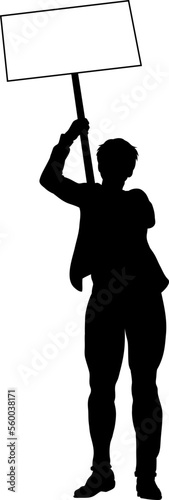 Protestor or demonstrator at a demonstration march, picket line or strike protest rally in silhouette. Holding up a banner or picket sign board placard.