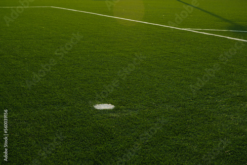 Close up shot of a penalty spot in football pitch