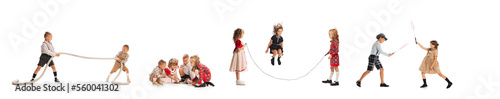 Horizontal banner with images of happy children in retro style clothes playing together, having fun isolated over grey background. Concept of childhood, friendship photo