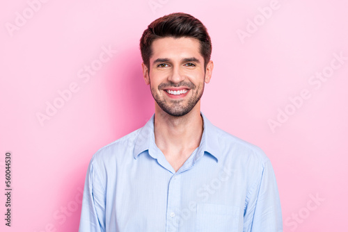 Photo of optimistic satisfied man demonstrate toothy smile good mood isolated on pink color background