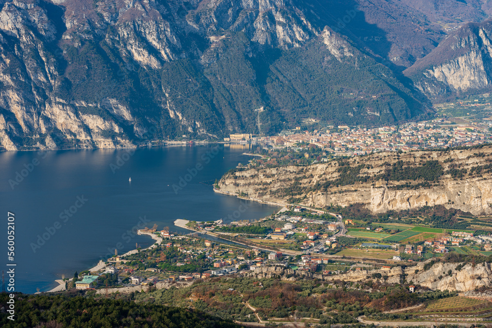 Aerial view of Lake Garda with the small towns of Riva del Garda and Torbole, the Sarca river and Alps view from the mountain range of Monte Baldo. Trento province, Trentino Alto Adige, Italy, Europe.