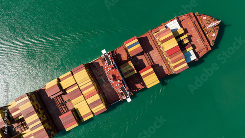 container cargo ship, import export commerce business and industry service logistic transportation  International by container cargo ship in open sea,  shipping logistic transport global  © SHUTTER DIN