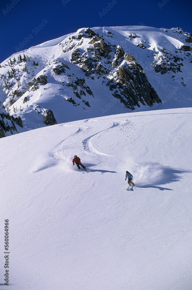 Man and woman skiing in Utah. Man and woman skiing in Utah.