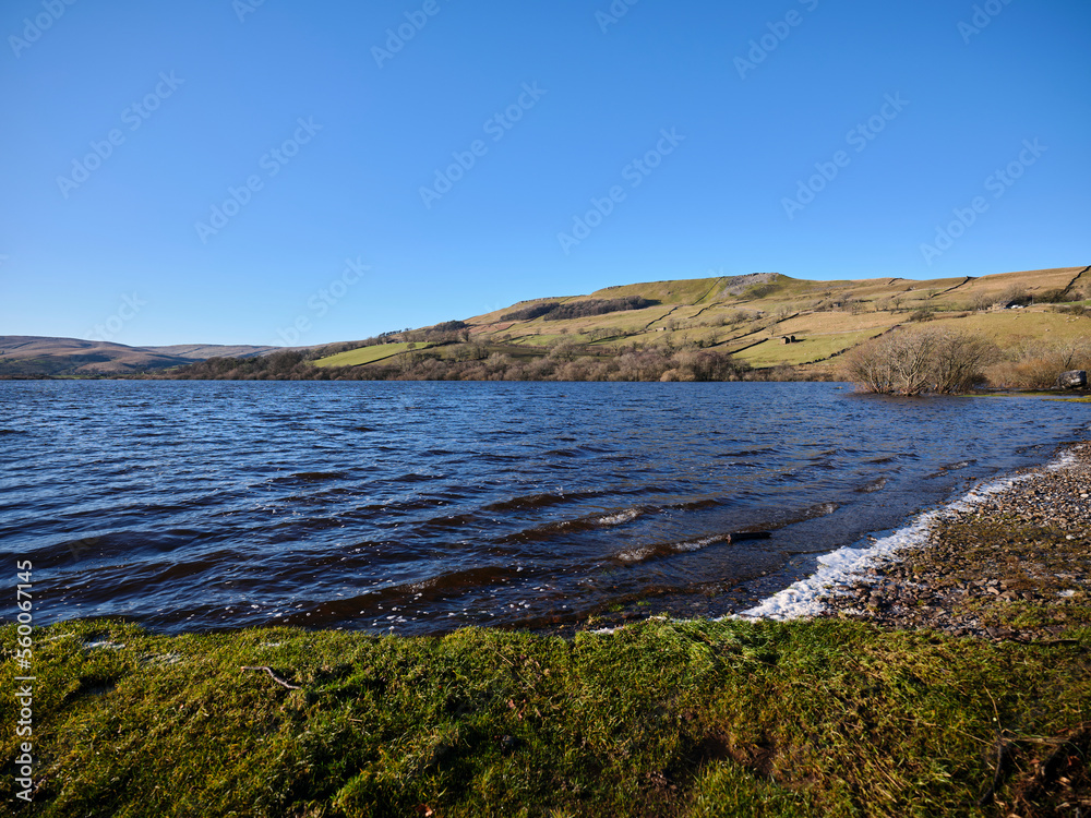 From the northern shore of Semerwater, looking north west towards Green Scar Mire Crag. Raydale. North Yorkshire