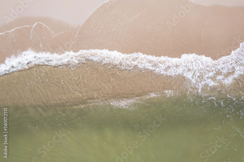 aerial view of an stunning beautiful sea beach with water waves