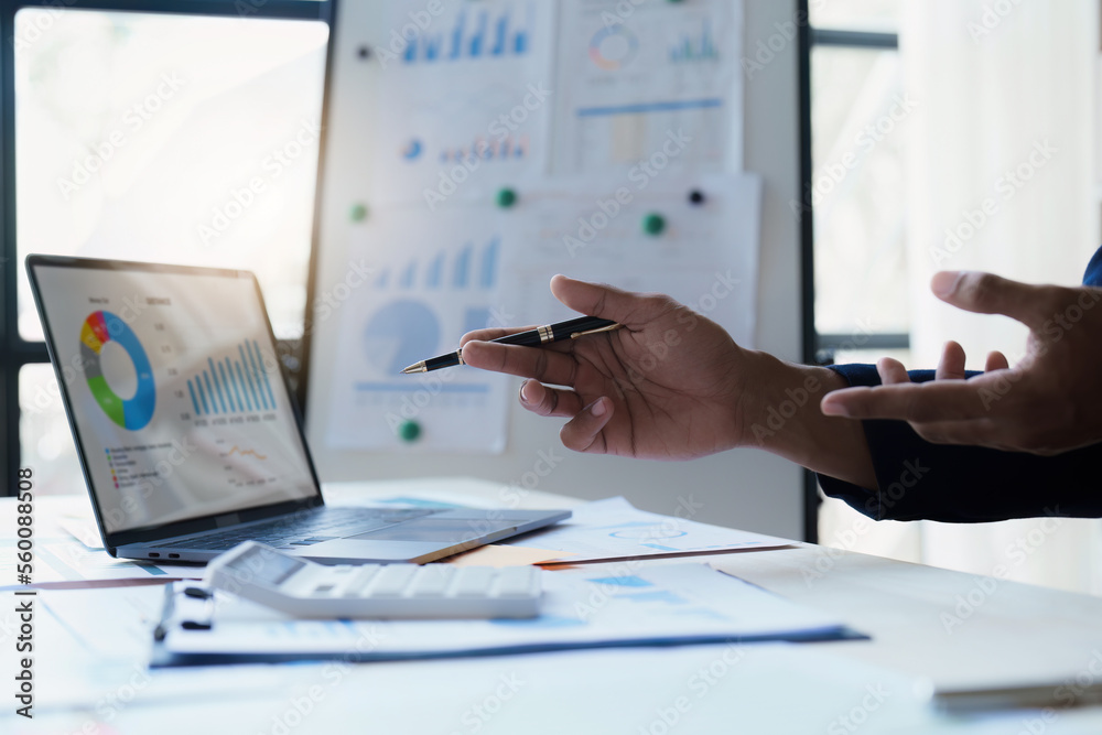 Close up Business man of financial analyze about company's graph profit. finance, strategy, meeting concept Close up Business man of financial analyze about company's graph profit. finance, strategy, meeting concept