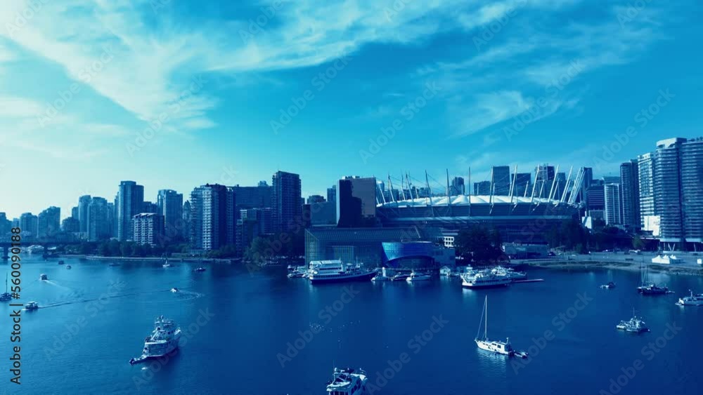 Vancouver BC Place False Creek anchored tour boats yachts close flyover waterfront vessels stadium plaza of nations sunny summer city skyline modern architecture ideal vacation place in Canada Vancouver BC Place False Creek anchored tour boats yachts close flyover waterfront vessels stadium plaza of nations sunny summer city skyline modern architecture ideal vacation place in Canada