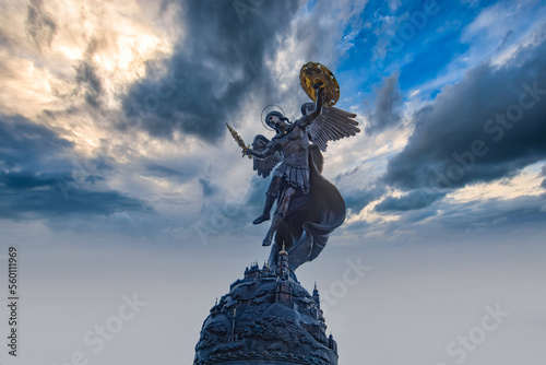 Fountain with a sculpture of Archangel Michael in the park Volodymyr Hill in Kyiv, Ukraine photo