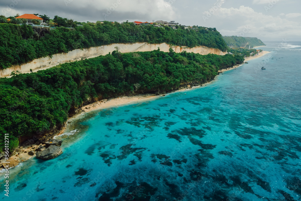 Panorama of coastline with turquoise tropical ocean and beaches in Bali. Aerial view