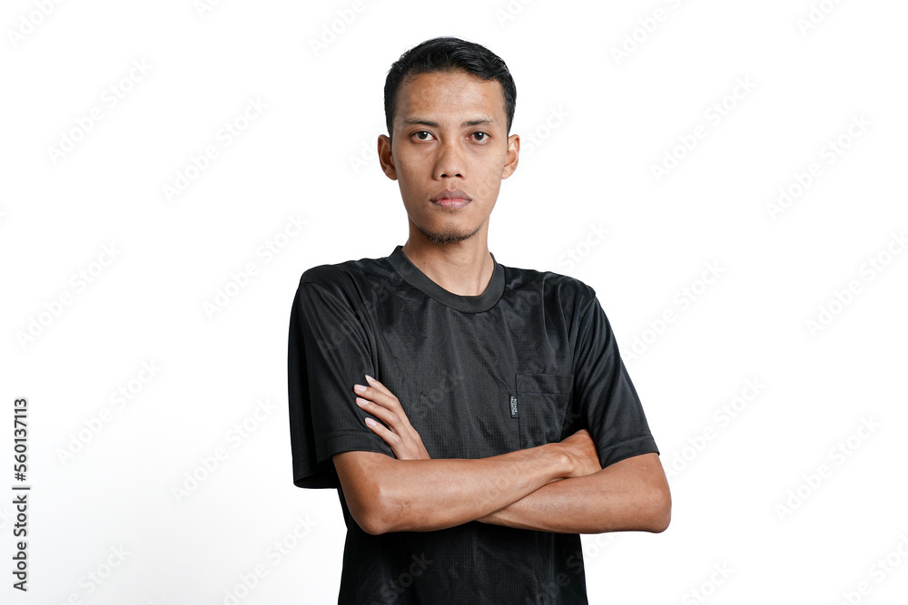 Asian man wearing black training t-shirt, showing stance standing tall and gallant. Isolated by white background Asian man wearing black training t-shirt, showing stance standing tall and gallant. Isolated by white background