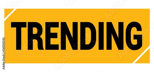 TRENDING text on yellow-black grungy stamp sign.