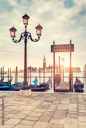 Gondolas in Venice, Italy at sunrise.