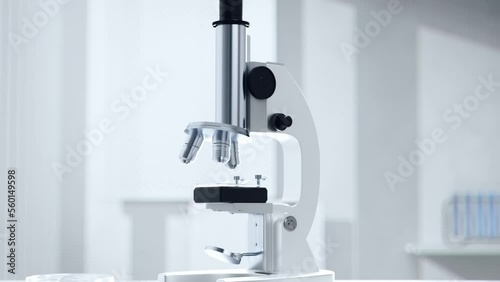 Medical laboratory desktop. The camera flies into the microscope (ID: 560149598)