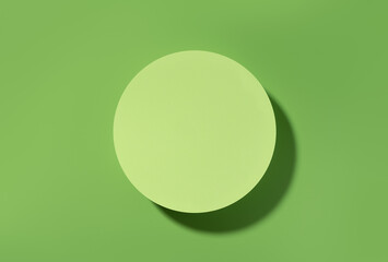 Green circle scene for product presentation, green stage flat lay. Studio photography.