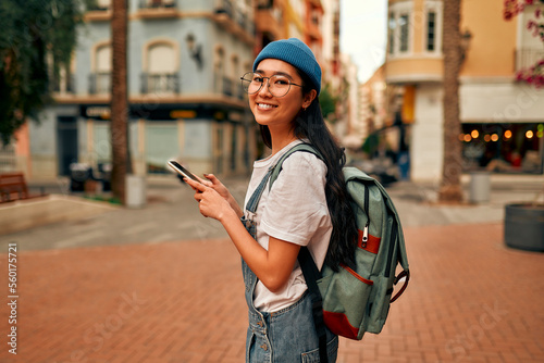 Asian female tourist student on city streets