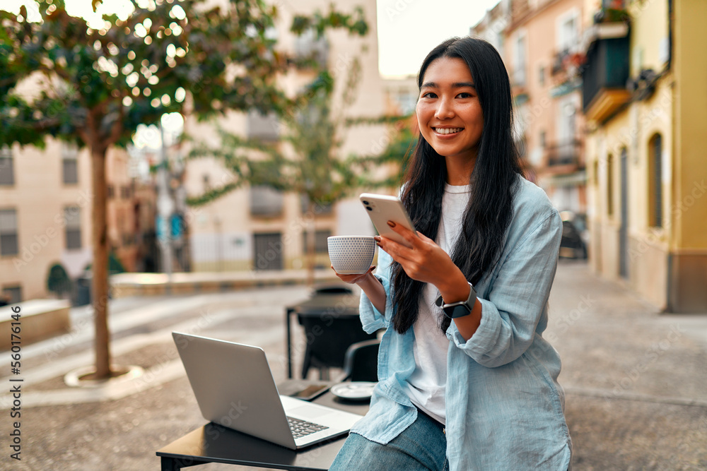 Asian female tourist student on city streets