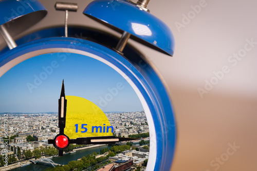 Vászonkép Ringing twin bell vintage classic alarm clock with the 15 minute city concept