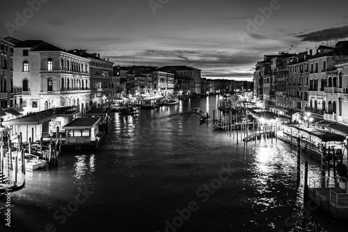 Evening cityscape in Venice  Italy  Sunset over Grand Canal from Rialto Bridge in black and white