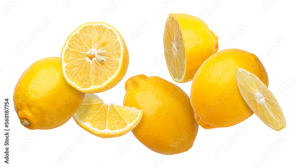 Lemons, halves and pieces are flying on a white background. Isolated