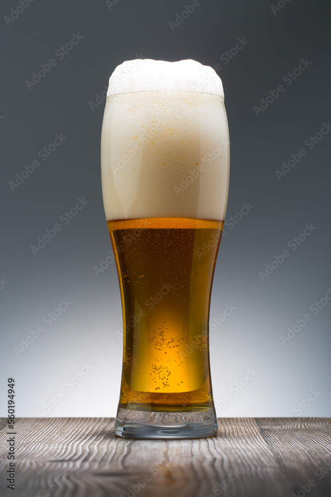 Cold Craft light Beer in a glass. Close up of a pint of beer