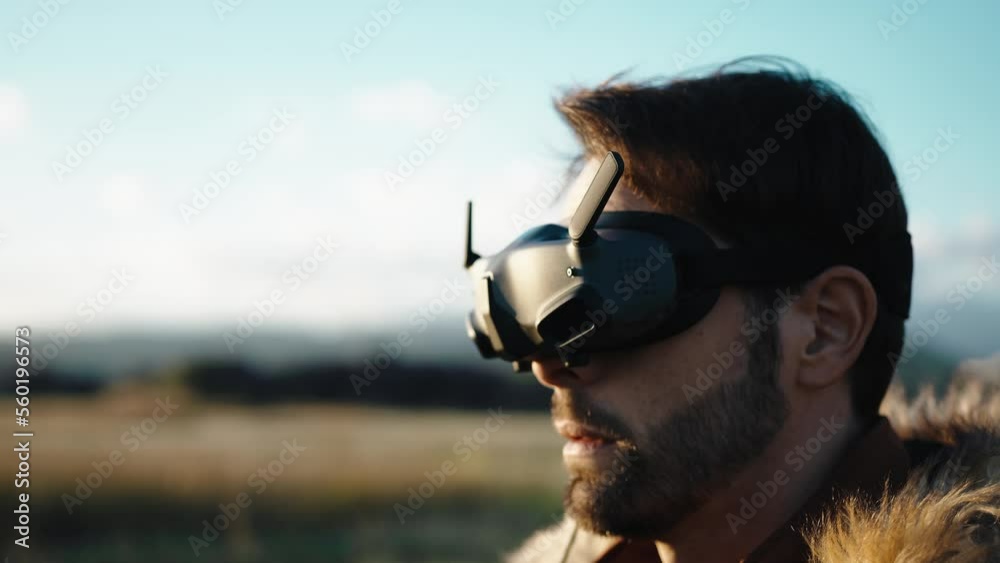 Close-up of a man drone fpv operator with vr goggles