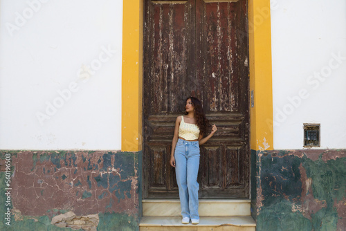 woman standing near the wall © @skuder_photographer
