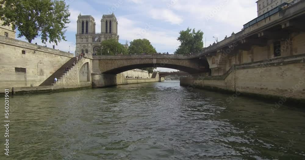 Passing under the Petit Pont in Paris Passing under the Petit Pont in Paris