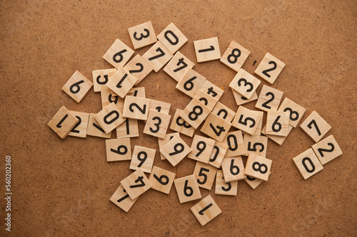 tiles with numbers, numerology and math concept photo