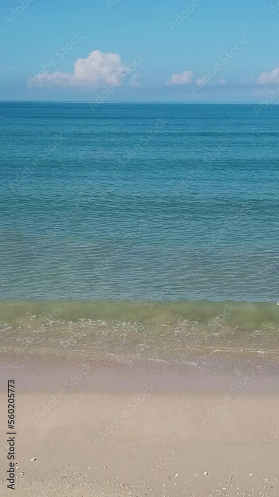 Aerial video of beauty deserted beach and calm sea in Thailand. Vertical video Aerial video of beauty deserted beach and calm sea in Thailand. Vertical video