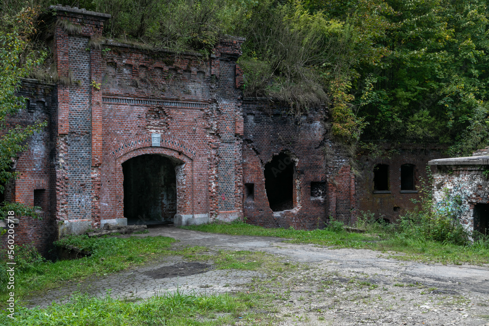 Entrance to a bunker of the Second World War. Red brick military building in the old German style of the 19th century Prussia. Fort VIII King Frederick is located in Kaliningrad, formerly Konigsberg.