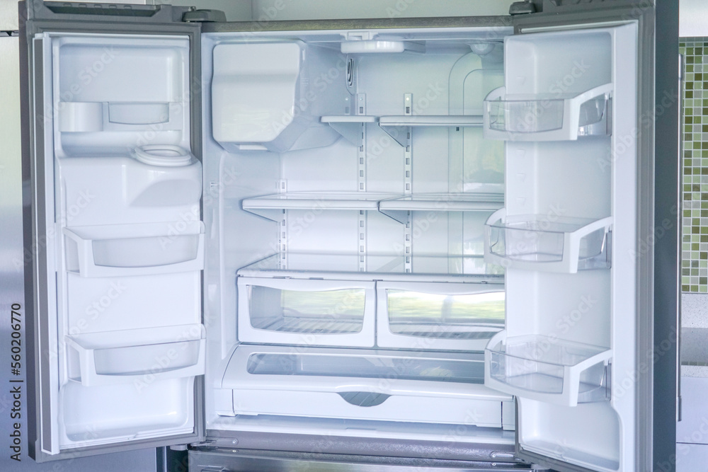 empty refrigerator with door open empty refrigerator with door open