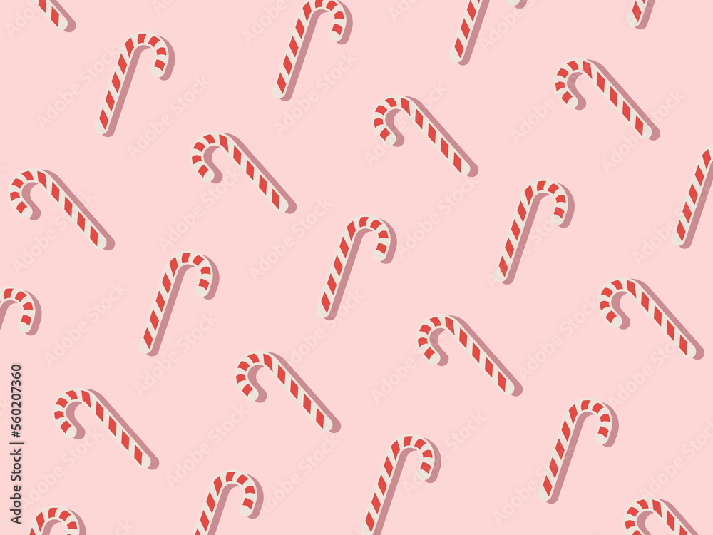 Christmas pattern with candy cane for party design on pink background Christmas pattern with candy cane for party design on pink background