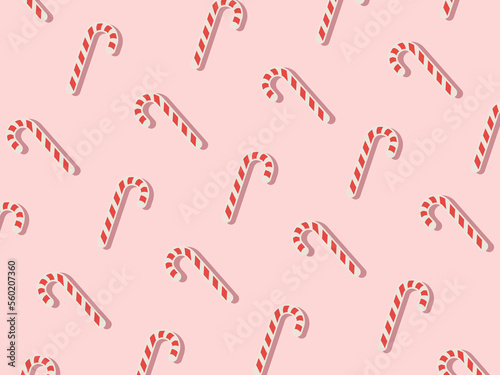 Christmas pattern with candy cane for party design on pink background