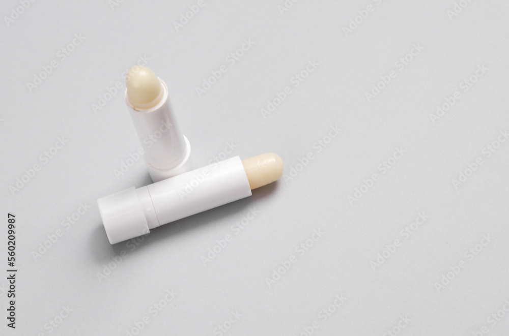 Hygienic lip balm on a gray background Hygienic lip balm on a gray background