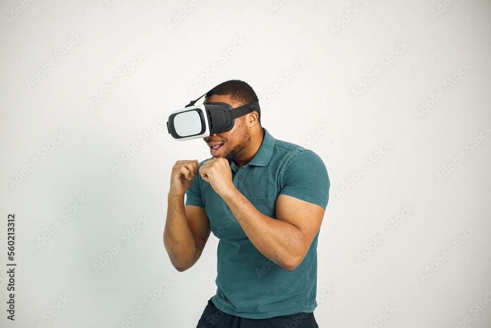 Black guy with virtual reality glasses isolated on white background Black guy with virtual reality glasses isolated on white background
