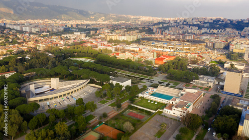Aerial view of Stadio Diego Armando Maradona, formerly Stadio San Paolo, and the fountain of the Esedra, the largest fountain in Naples, Italy. They are located in the Fuorigrotta district. photo