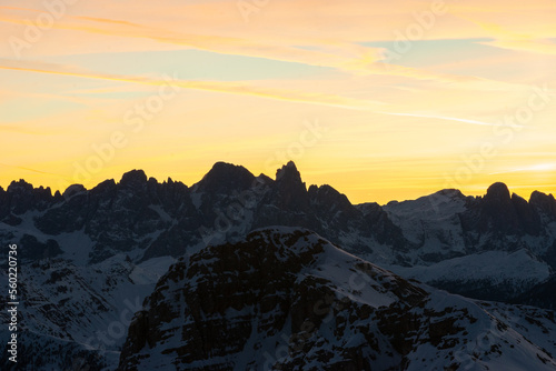 sunrise in the snow dolomites photo