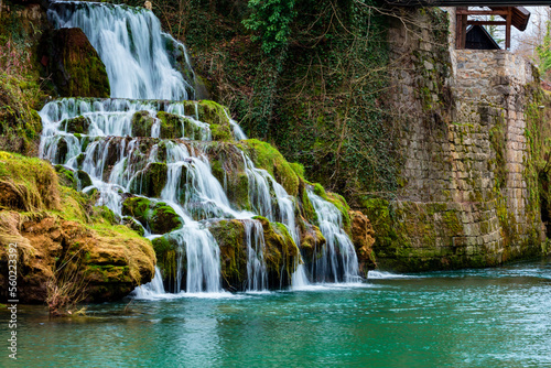 Stunning green colored river makes even prettier waterfall, spring time in Croatia, Europe
