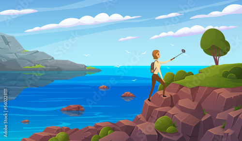 Traveling and technology concept. Lady with smartphone posing for photo on background of seascape. Woman taking selfie on cliff near sea. Girl traveling on ocean rocky shore with beautiful scenery