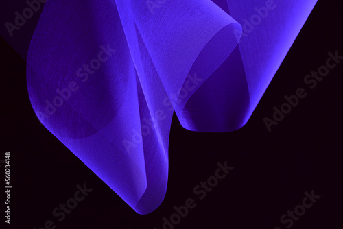 Futuristic abstract background. Translucent unusual shapes. Organza on a dark background. Purple fabric texture.
