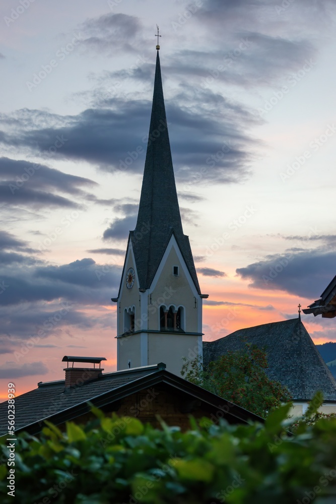 Wagrain, Austria - church with cemetery in the evening at sunset