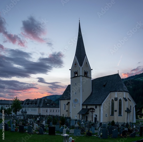 Wagrain, Austria - church with cemetery in the evening at sunset