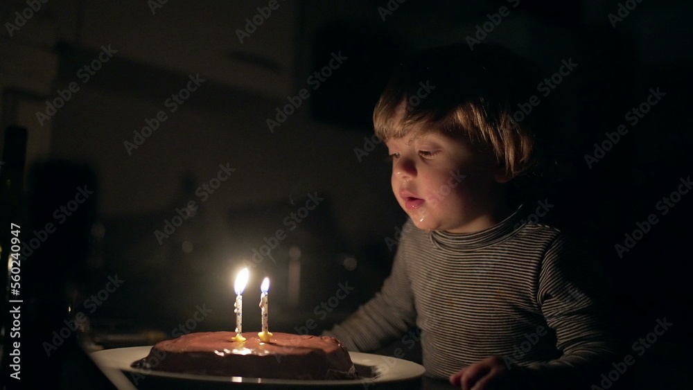 Baby boy blows magic candle re-emerging relight Baby boy blows magic candle re-emerging relight