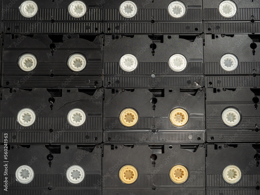 Background from old VHS cassettes. Retro video cassettes. Background from old VHS cassettes. Retro video cassettes.
