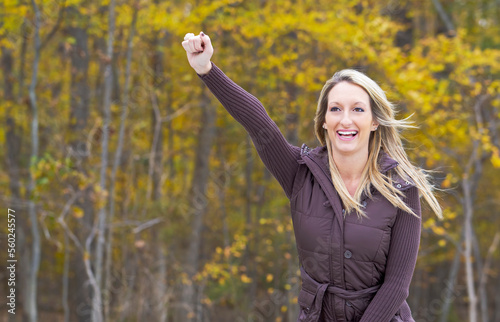 Gorgeous Blonde Model Enjoying The Fall Foliage Outdoors