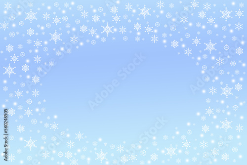 Fototapeta Naklejka Na Ścianę i Meble -  Winter nature snowfall background with central copy space. blue snow blurred abstract snowflake texture Abstract white powder snow cloud border on dark surface. Design of picture frame for websites