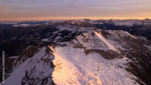 sunrise in the snow dolomites photo