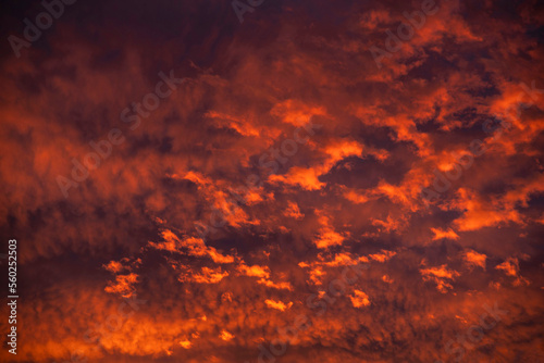 Texture of sunset with clouds on a red sky