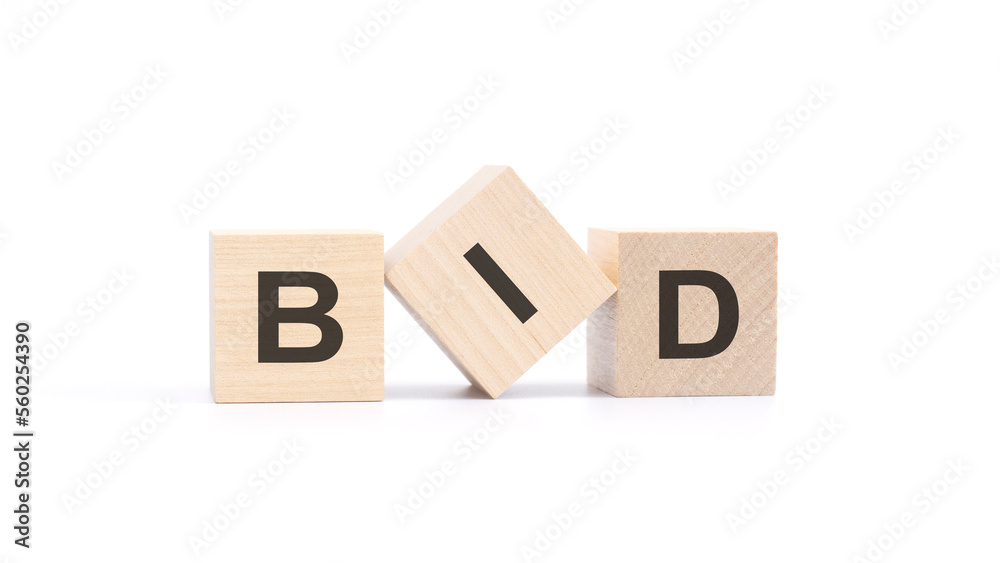 BID - acronym from wooden blocks with letters, questions and answers concept, top view on white background BID - acronym from wooden blocks with letters, questions and answers concept, top view on white background